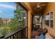 Relaxing balcony with views of tall trees and the surrounding buildings at 6513 Sand Shore Ln, New Port Richey, FL 34652