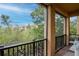 Private balcony overlooking lush greenery, with comfortable seating and a peaceful ambiance at 6513 Sand Shore Ln, New Port Richey, FL 34652