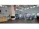 Spacious clubhouse features high ceilings, ample seating, and a bar area at 6513 Sand Shore Ln, New Port Richey, FL 34652