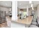 Bright, modern kitchen with stainless steel appliances, granite countertops, and an open layout at 6513 Sand Shore Ln, New Port Richey, FL 34652