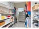 Organized walk-in closet with shelving and drawers for storage and plenty of hanging space at 6513 Sand Shore Ln, New Port Richey, FL 34652