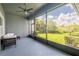 Covered lanai looking out on a meticulously maintained lawn and landscaping at 6817 Ebb Tide Ave, Apollo Beach, FL 33572