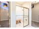 Modern bathroom featuring a glass-enclosed shower with a built-in bench at 6817 Ebb Tide Ave, Apollo Beach, FL 33572