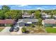 Aerial view shows the front of the house and driveway at 6834 Mesa Verde St, Port Richey, FL 34668