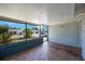 Cozy front porch offering an inviting outdoor seating area at 6834 Mesa Verde St, Port Richey, FL 34668