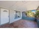 Charming front porch featuring patterned tile flooring and a bright entrance at 6834 Mesa Verde St, Port Richey, FL 34668