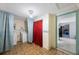 A bright laundry area with essential appliances, adjacent to a kitchen at 6834 Mesa Verde St, Port Richey, FL 34668
