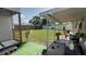Features a backyard with a shed, green space, and a patio at 7206 Reindeer Rd, Tampa, FL 33619