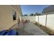 Concrete patio area with a privacy fence at 7206 Reindeer Rd, Tampa, FL 33619