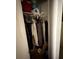 View of a closet with clothes hanging, showing ample storage space at 7206 Reindeer Rd, Tampa, FL 33619