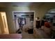 Bedroom closet shows ample storage and a partially visible pink bedspread at 7206 Reindeer Rd, Tampa, FL 33619