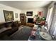 A cozy living room with stylish decor, comfortable seating, and artwork that gives character to the room at 7206 Reindeer Rd, Tampa, FL 33619