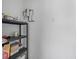 Unfinished basement storage area with shelves and utility fixtures at 7571 Ridge Rd, Seminole, FL 33772