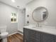 Modern bathroom with shower, tile flooring and sink with vanity at 7571 Ridge Rd, Seminole, FL 33772