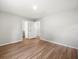 Bedroom features hardwood floors and a spacious closet at 7571 Ridge Rd, Seminole, FL 33772