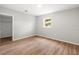 Bedroom features hardwood floors, closet and a window allowing natural light at 7571 Ridge Rd, Seminole, FL 33772