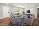 Bright living room features modern furniture, a stylish rug, and plenty of natural light at 7571 Ridge Rd, Seminole, FL 33772
