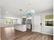 Open living space with hardwood floors and modern fixtures at 7571 Ridge Rd, Seminole, FL 33772