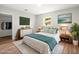 Cozy bedroom with comfortable furnishings, modern decor, and soft natural light at 7571 Ridge Rd, Seminole, FL 33772