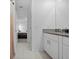 Bathroom vanity and walk-in closet at 81 Rain Lily Ave, Spring Hill, FL 34609