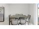 Contemporary dining area featuring a sleek table and comfortable seating at 81 Rain Lily Ave, Spring Hill, FL 34609