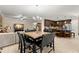 Inviting living space combines dining, living, and kitchen areas in an open layout, great for entertaining at 829 Date Palm Ln, St Petersburg, FL 33707