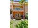 Inviting outdoor patio with comfortable seating, grill, and access to the interior through French doors at 829 Date Palm Ln, St Petersburg, FL 33707