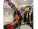 Well-organized walk-in closet with shelves, hanging rods, shoe racks and ample storage space at 829 Date Palm Ln, St Petersburg, FL 33707