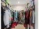Spacious walk-in closet featuring ample shelving and hanging space for organized storage at 829 Date Palm Ln, St Petersburg, FL 33707