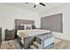 Spacious main bedroom with modern furnishings, a large window, and an inviting, comfortable atmosphere at 8714 Palm Ranches Pl, Tampa, FL 33614
