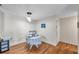 Bright dining area features wood floors, table with floral tablecloth, and modern lighting at 9481 Highland Oak Dr # 806, Tampa, FL 33647