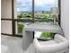 Bedroom desk area with serene outdoor views, providing an ideal workspace at 1 Key Capri # 606W, Treasure Island, FL 33706