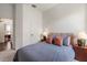 Cozy bedroom featuring a queen-sized bed with contemporary decor and ample lighting at 10021 Brompton Dr, Tampa, FL 33626