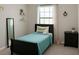 Charming bedroom with soft colors and natural light creates a serene and inviting space at 10108 Rosemary Leaf Ln, Riverview, FL 33578