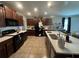 Spacious kitchen with stainless steel appliances, granite countertops, and a center island at 10108 Rosemary Leaf Ln, Riverview, FL 33578