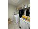 Functional laundry room with modern appliances and ample storage space at 10108 Rosemary Leaf Ln, Riverview, FL 33578