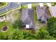 Aerial view of a residential property, showing the home's layout and surrounding community at 11144 Paradise Point Way, New Port Richey, FL 34654