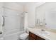 Bathroom featuring a bathtub, shower, toilet, vanity, and towel rack at 11144 Paradise Point Way, New Port Richey, FL 34654