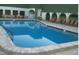 Enjoy the community pool with ample seating and a bright, inviting atmosphere at 11144 Paradise Point Way, New Port Richey, FL 34654