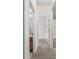 Hallway providing access to the bathroom and living room at 11144 Paradise Point Way, New Port Richey, FL 34654