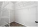 Walk-in closet has wire shelving for all of your storage needs at 11144 Paradise Point Way, New Port Richey, FL 34654