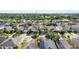 A peaceful community with a variety of home styles, tree-lined streets, and lush green spaces at 11539 Tangle Branch Ln, Gibsonton, FL 33534