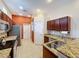 Spacious kitchen with stainless steel appliances, granite countertops, and ample storage at 12200 Hunters Lake Dr, New Port Richey, FL 34654