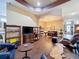 Spacious living room with hardwood floors, custom ceiling and open floorplan at 12200 Hunters Lake Dr, New Port Richey, FL 34654