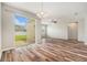 Open dining area with sliding glass doors leading to the backyard at 12322 Eagle Swoop Pl, Riverview, FL 33579
