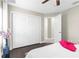Cozy bedroom includes a closet and neutral walls at 12333 Harris Hawk Rd, Weeki Wachee, FL 34614