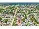 Birds-eye view of a quiet, suburban neighborhood with lush greenery and easy street access at 12476 81St Ct, Seminole, FL 33772
