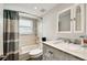 Bathroom featuring bright vanity area with tiled backsplash and modern faucet at 12476 81St Ct, Seminole, FL 33772