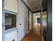 Hallway with access to multiple rooms offers easy movement throughout the home at 12704 Lacey, New Port Richey, FL 34654