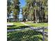 A view of Moon Lake Park, showcasing green spaces, trees, and recreational facilities at 12704 Lacey, New Port Richey, FL 34654